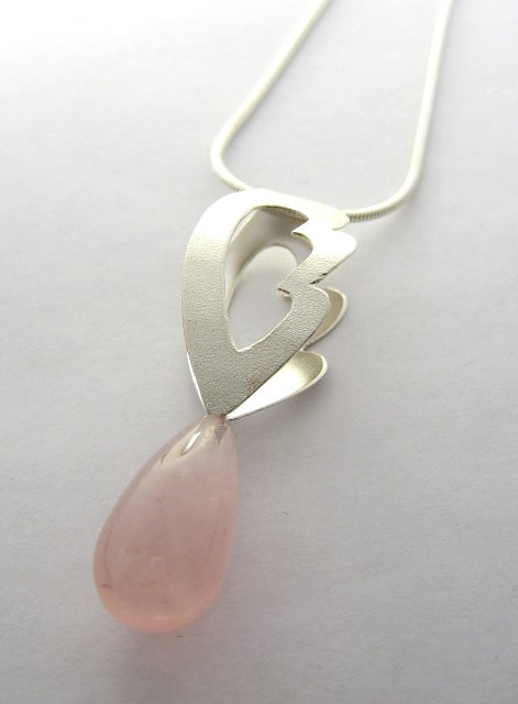 Dream-riipus (hopea ja ruusukvartsi)